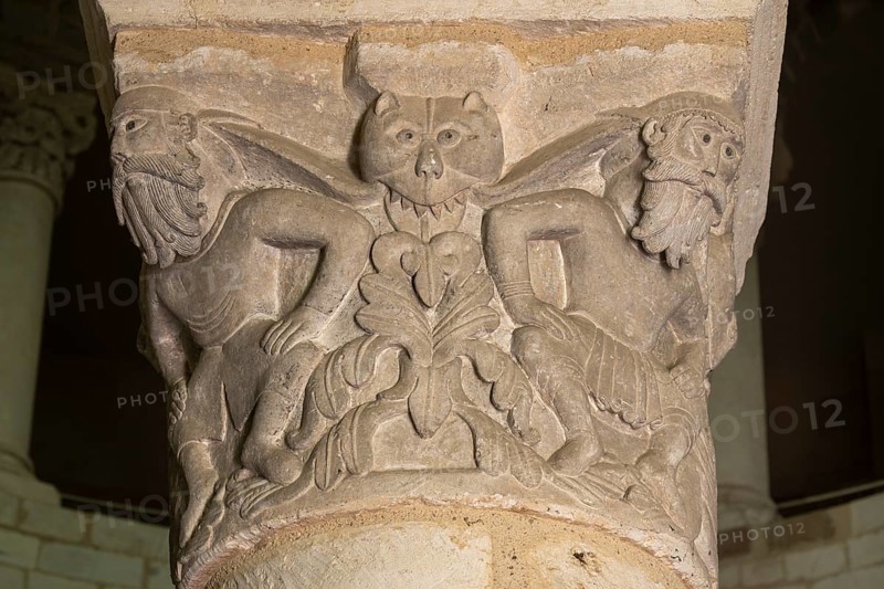 Neuvy-Saint-Sépulchre, collegiate church of St-Jacques, rotunda, column capitals, bearded men with mythical creatures