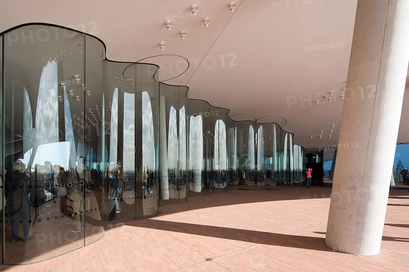 Hamburg, Elbphilharmonie, foyer called Plaza, wave-shaped glass wall to separate the Plaza into outdoor and indoor areas, designed by Herzog & de Meuron, built 2007-2016