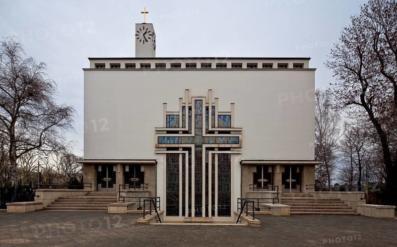 Built in 1930-32 by Hans Heinrich Grotjahn, reinforced concrete skeleton construction, tower with gilded cross 43 m high, entrance façade in the south with courtyard of honour in front, St., Sankt, Saint