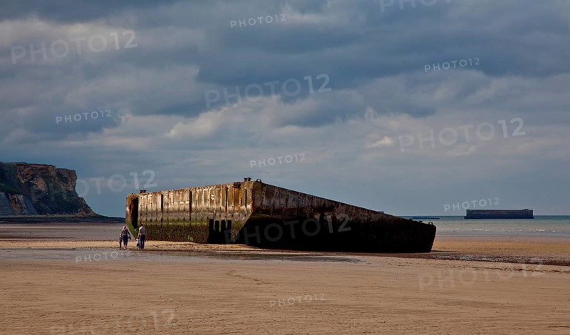 Channel coast with relics of the allied MULBERRY landing party on the sixth of June 1944, so-called D-Day