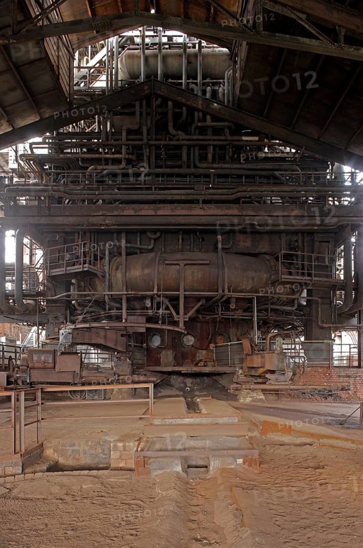 Former Thyssen AG steelworks, tapping hall at blast furnace 5 with tapping hole, drilling machine and tamping machine