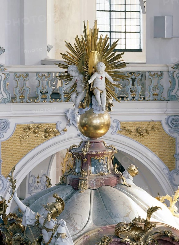 The infant Jesus on the crowning of the altar of grace. The Vierzehnheiligen Basilica near Bad Staffelstein in the district of Lichtenfels is a pilgrimage church in Upper Franconia. The church, built according to plans by Balthasar Neumann, is dedicated to the Fourteen Holy Helpers and receives around half a million visitors a year