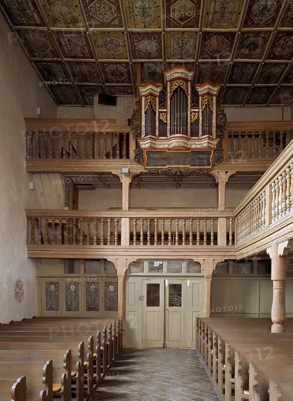 St Burkhard's cemetery church. View of the organ from 1751, made by Johann Rudolf Voit (Schweinfurt) . Coffered ceiling from the 17th century by Erasmus Jahn, St., St., Saint