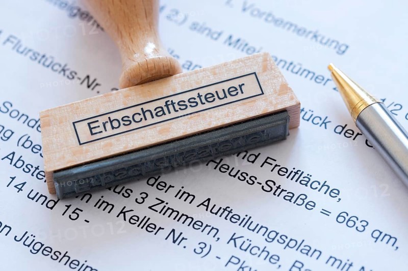 Stamp with the inscription inheritance tax, tax revenue, inheritance, will, assets, taxation