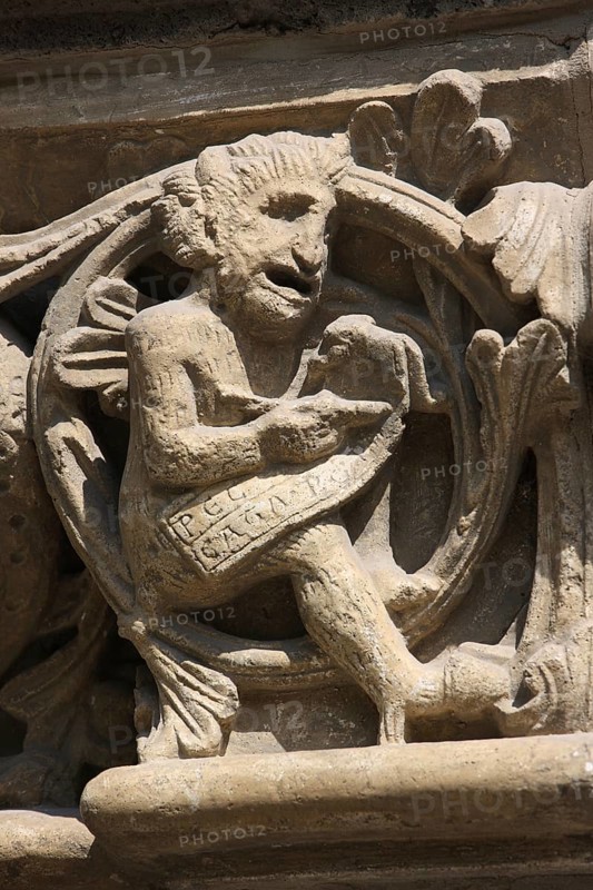 Romanesque capital on the west side of Paradise, Devil noting sins, St., Saint, Saint