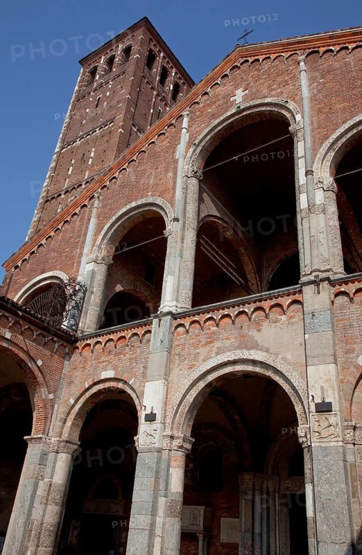 Italy Milan Milan Church of San Ambrogio 12th century West façade with Benedictine loggia above Campanile dei Canonici Oblique view from below, St., Saint, Saint