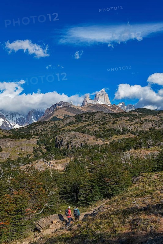 Trekkers at Cascada Martin with a view of the Fitzroy Massif, El Chaltén, Los Glaciares National Park, Santa Cruz, Patagonia, Argentina, South America