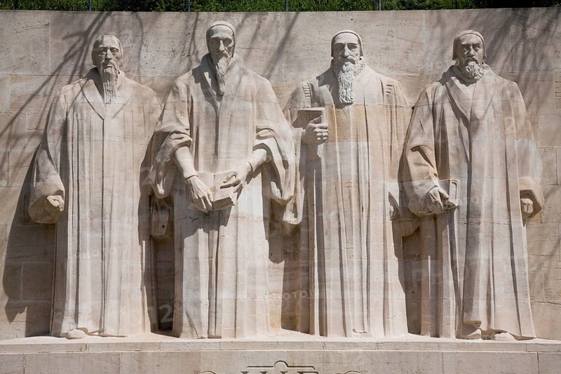 International monument to the Reformation with monumental figures of Guillaume Farel, John Calvin, Théodore de Bèze, John Knox