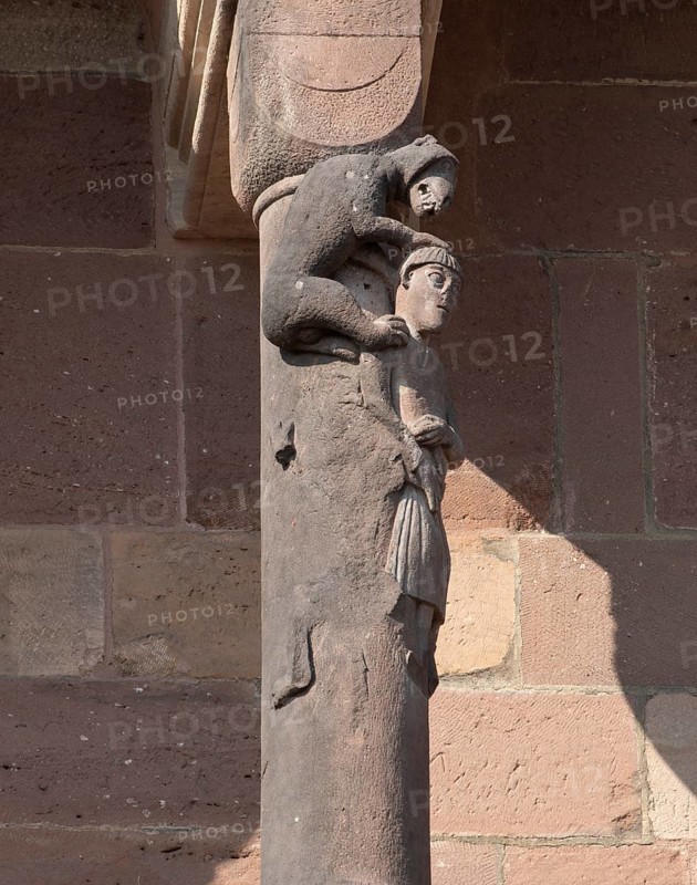 Worms, St Peter's Cathedral, east choir, figure on the dwarf gallery, master builder with the monkey