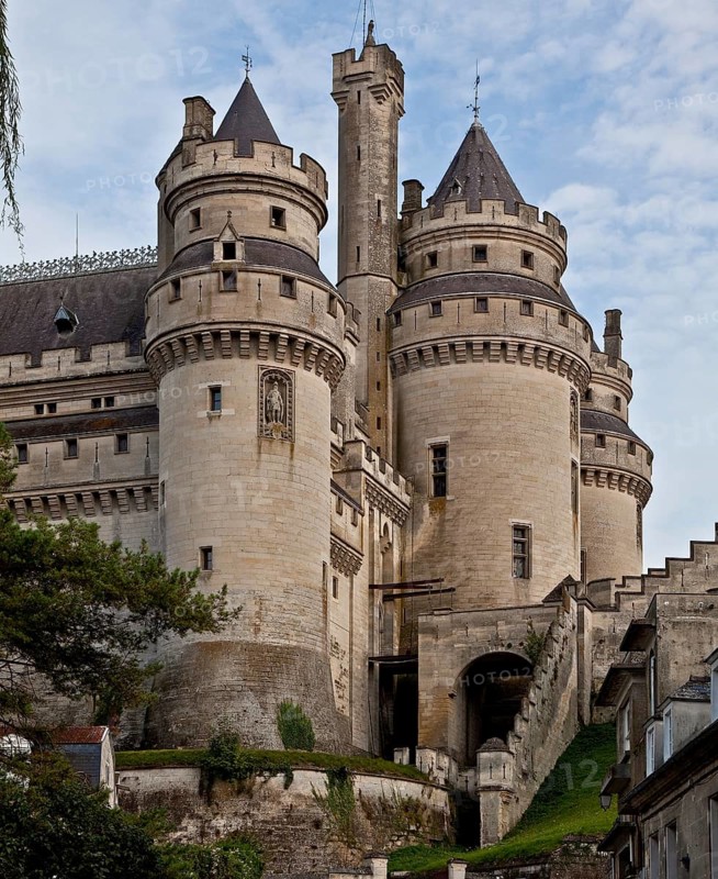 Rebuilt by Viollet-le-Duc 1857-84, southern towers from the west, Tour Arthus with figure of the king on the left