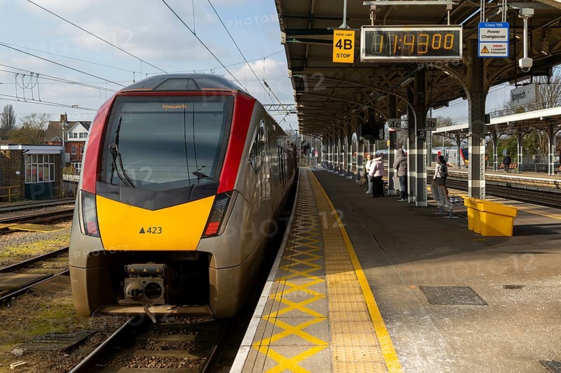 Greater Anglia, British Rail Class Stadler 755 bi-modal multiple unit passenger train arriving at Ipswich railway station, Suffolk, England, UK