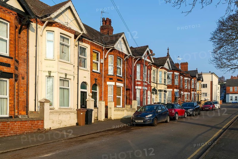 Terraced villas with bay windows front gardens, Tempest Street, inner city of Lincoln, Lincolnshire, England, UK