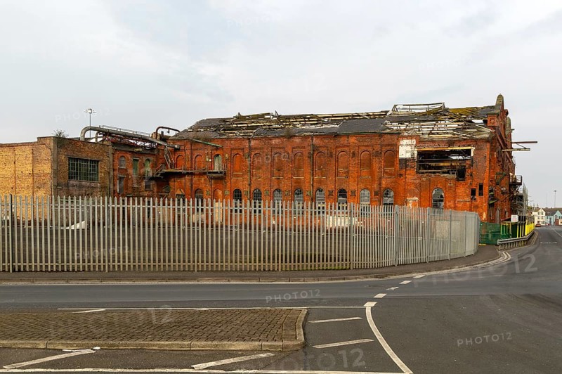 Derelict ruin of Great Grimsby Ice Factory built in 1900, Grimsby docks, north east Lincolnshire, England, UK