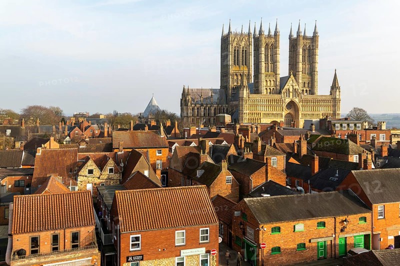 West frontage of Lincoln cathedral church viewed from castle walls, city of Lincoln, Lincolnshire, England, UK