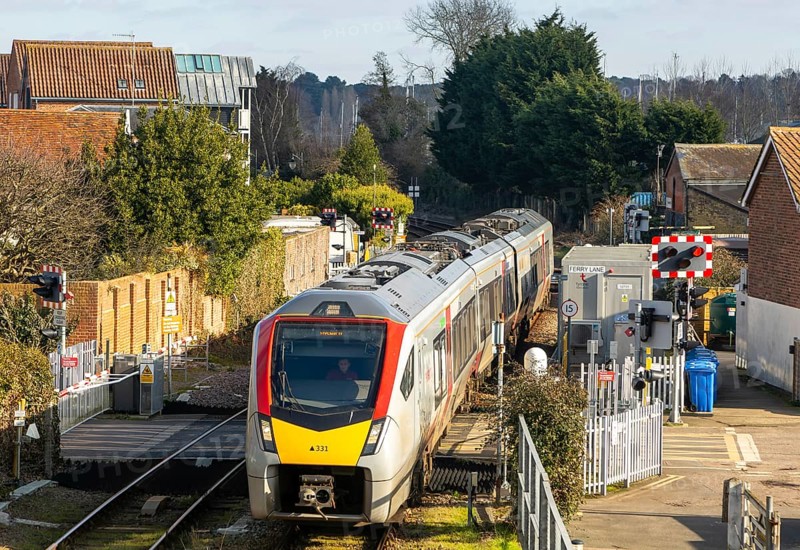 Greater Anglia, British Rail Class Stadler 755 bi-modal multiple unit passenger train arriving at Woodbridge, Suffolk, England, UK
