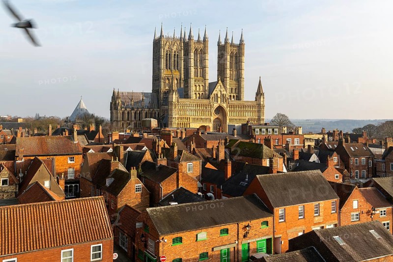 West frontage of Lincoln cathedral church viewed from castle walls, city of Lincoln, Lincolnshire, England, UK