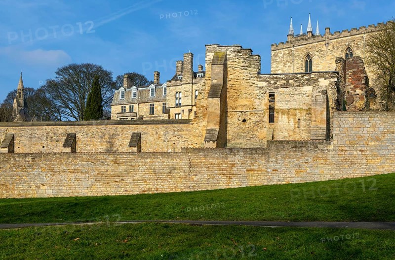Walls of medieval Bishops' Palace from Temple Gardens park, city of Lincoln, Lincolnshire, England, UK