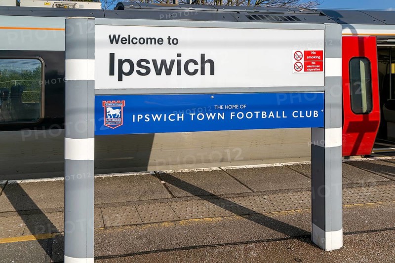 Welcome to Ipswich sign, home of Ipswich Town Football Club, platform of railway station, Ipswich, Suffolk, England, UK