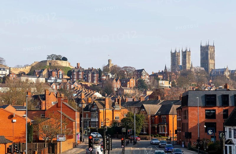 Castle and cathedral in Uphill area viewed from Brayford Way in city centre, Lincoln, Lincolnshire, England, UK