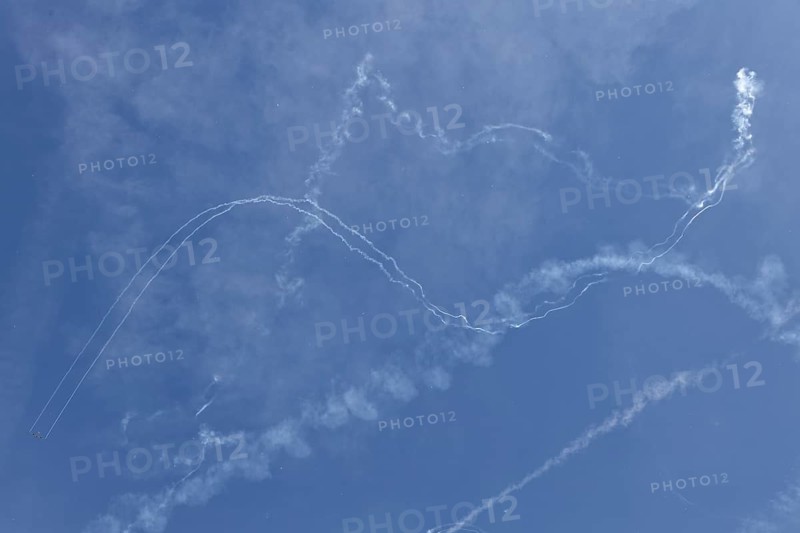 Airshow, glider contrails against blue sky, Montreal, Province of Quebec, Canada, North America