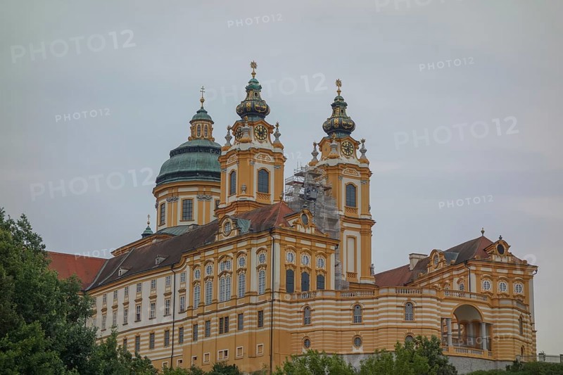 Impressive baroque church with decorative copper roofs and sky, donau, austria