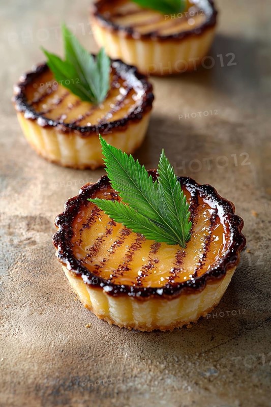 Three petite fruit tarts are displayed on a rough, textured surface. The focus is on the nearest tart, showcasing its glossy fruit glaze and dark crust edges, topped with green leaves as garnish, AI generated