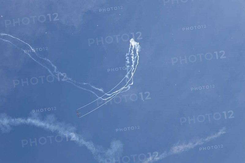 Airshow, glider contrails against blue sky, Montreal, Province of Quebec, Canada, North America