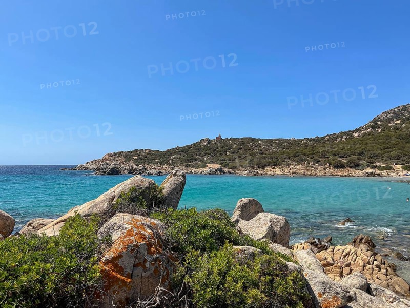 View of coast with rocks and clear blue water, cagliari, sardinia, italy