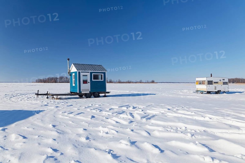 Winter, ice fishing hut on the Saint Lawrence River, Province of Quebec, Canada, North America