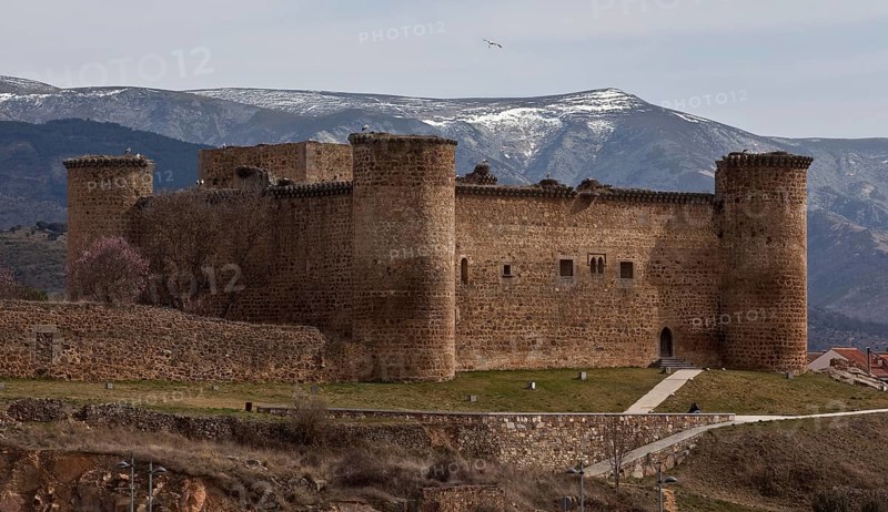 Castillo de Valdecorneja from the north behind the Sierra de Gredos