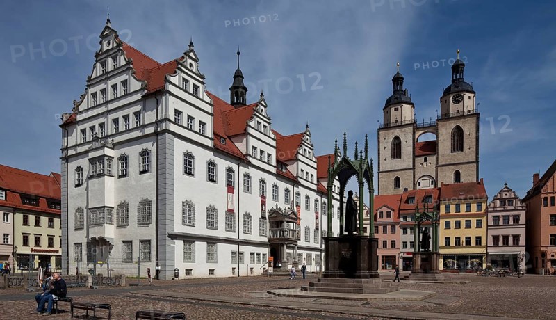 Wittenberg Market Square 79623 Town Hall 16th century by Sebastian Krüger Town Church 14-16th century in front Melanchthon Monument by Johann Heinrich Strack Luther Monument by Gottfried Schadow both 19th century