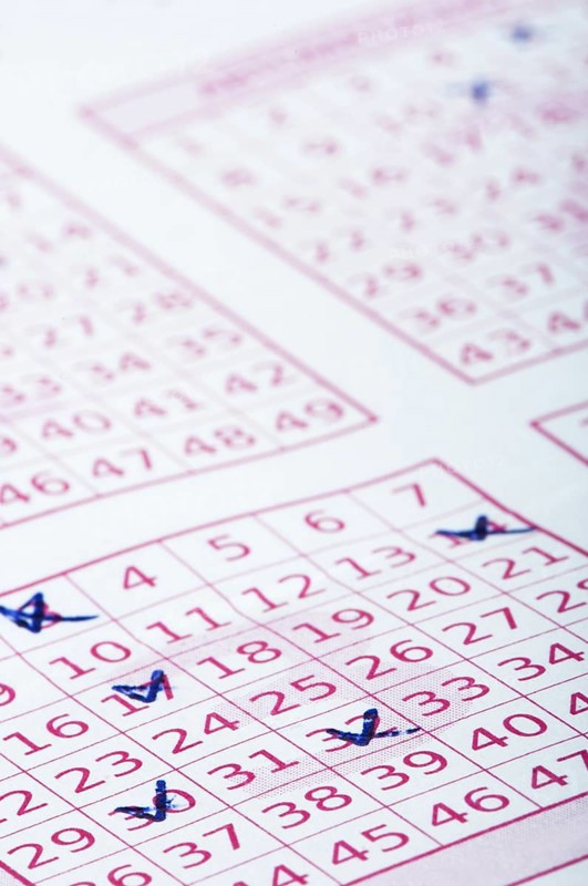 Marked lottery ticket close up. Studio shot