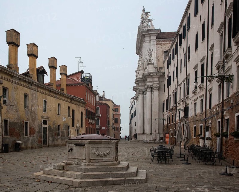 Italy Venice Gesuiti Church -385 built 1724-36 left Oratorio dei Crociferi late 16th century built with the collaboration of Palma il Giovane in front Cistern