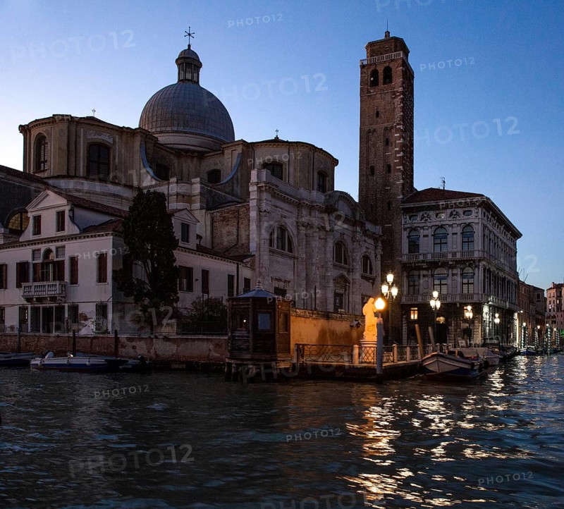 Italy Venice Church of San Geremia -531 on the Grand Canal built in the 18th century by Carlo Corbellini Campanile 13th century right Palazzo Labia at the beginning of the Cannarégio Canal 17th-18th century dusk
