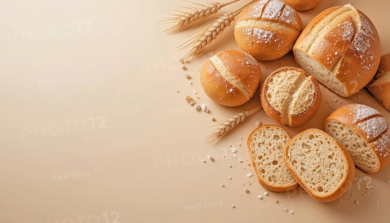 Round bread rolls and slices with wheat stalks on light background, AI generated