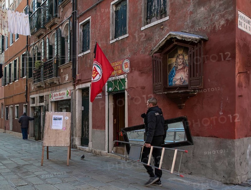 Italy Venice Side alley off the Fondamenta de la Tana -337 Corner house with Communist Party office and Christian devotional image side by side