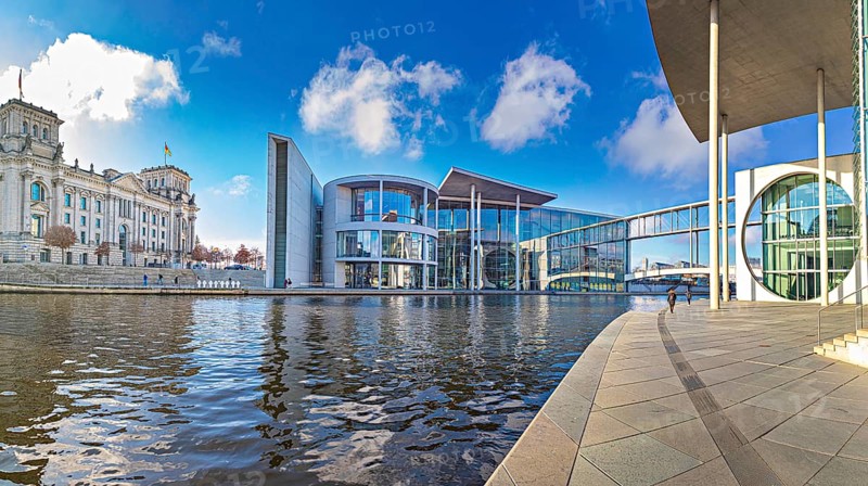 Spreebogen at the library of the German Bundestag with view of Paul-Löbe-Haus, Bundestag, Jakob-Mierscheid-Steg and Reichstag building in Berlin, Germany, Europe