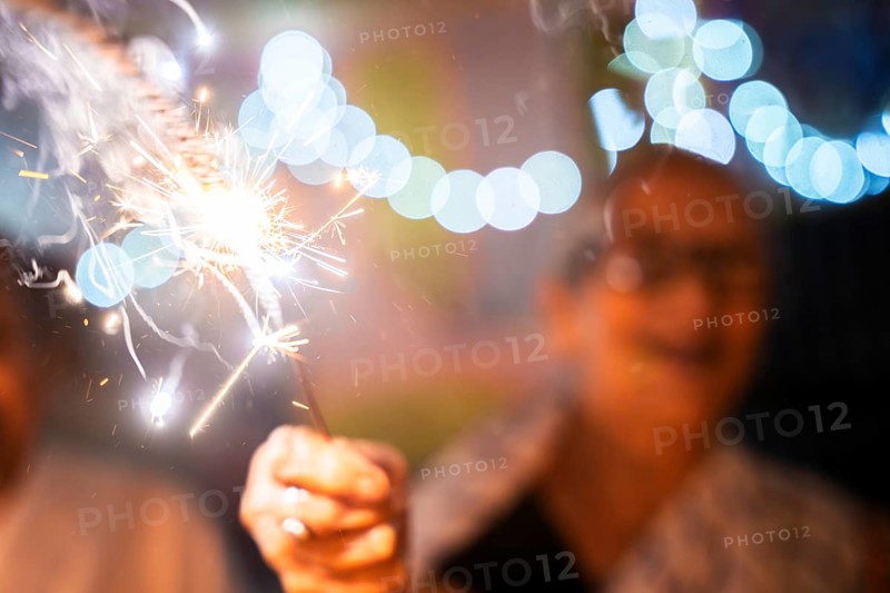 An elderly woman of Pramod Talukdar Memorial Old Age Home burn sparkler crackersas she celebrate Diwali, in Guwahati, India on 1 November 2024. Diwali, also known as the Festival of Lights, is one of the most widely celebrated Hindu festivals, symbolizing the victory of light over darkness and good over evil