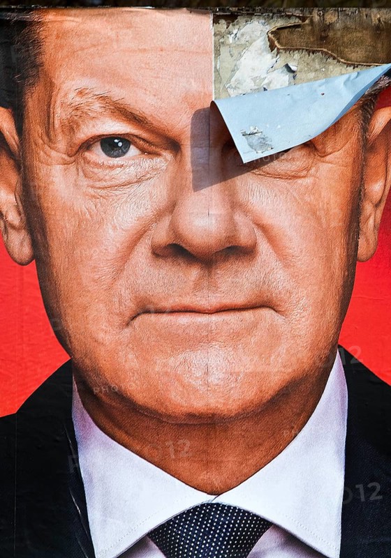 Partially destroyed large poster for the 2025 federal election by the SPD with Olaf Scholz, Witten, North Rhine-Westphalia, Germany, Europe