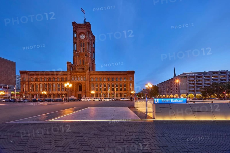 Red Town Hall with underground station and lanterns at dusk, Rathausstraße, Berlin, capital city, independent city, federal state Berlin, Germany, Europe