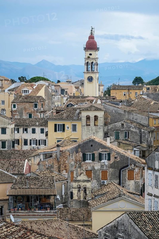 Corfu Town, Corfu, Greece, City overview Corfu Town with the Greek Orthodox Church of Agios Spiridon. Back mainland Albania, Europe