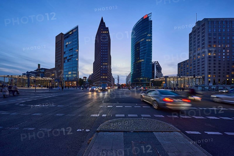 High-rise buildings Forum Tower, Kollhoff-Tower and Bahntower with car traffic in the blue hour at Potsdamer Platz, dusk in Berlin, capital, independent city, federal state Berlin, Germany, Europe