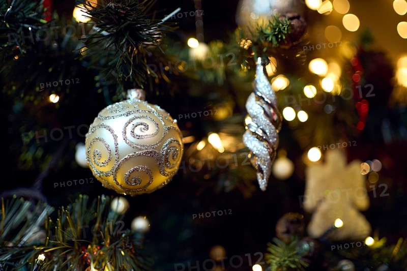 Close-up of Christmas baubles. Christmas composition with Christmas tree. Vintage decoration