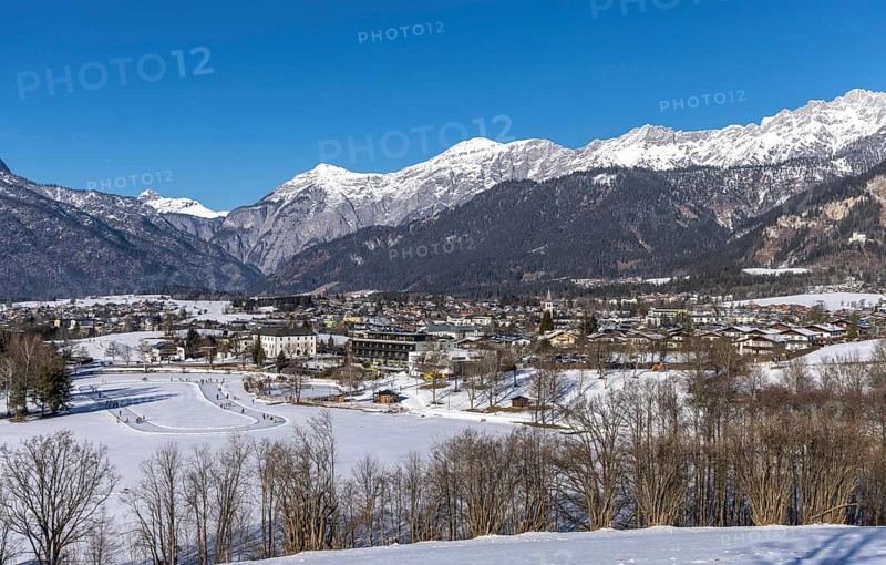 Winter panorama, Saalfelden am Steinernen Meer, Salzburg, ice skating on Lake Ritzensee