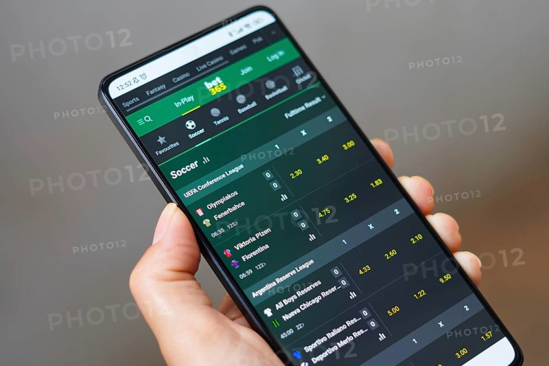 April 12, 2024, Brazil. In this photo illustration, the the Bet365 sports betting platform is seen on a smartphone screen. Several cities around the world are in the process of legalizing sports betting