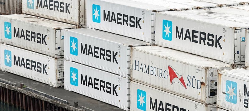 Large group of sea cargo freight containers Maersk and Hamburg Süd stacked on pier in container terminal warehouse commercial sea port in Pacific Ocean. Kamchatka Peninsula, Russia, August 27, 2019, Europe