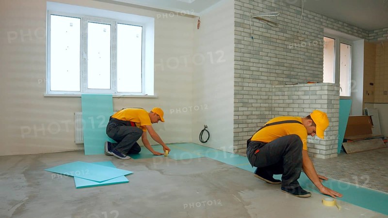 Builders insulated floor in a large house. Thermal insulation of the floor in the apartment
