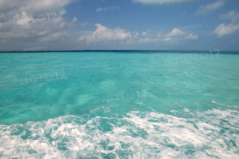 Caribbean blue turquoise sea water color from boat view