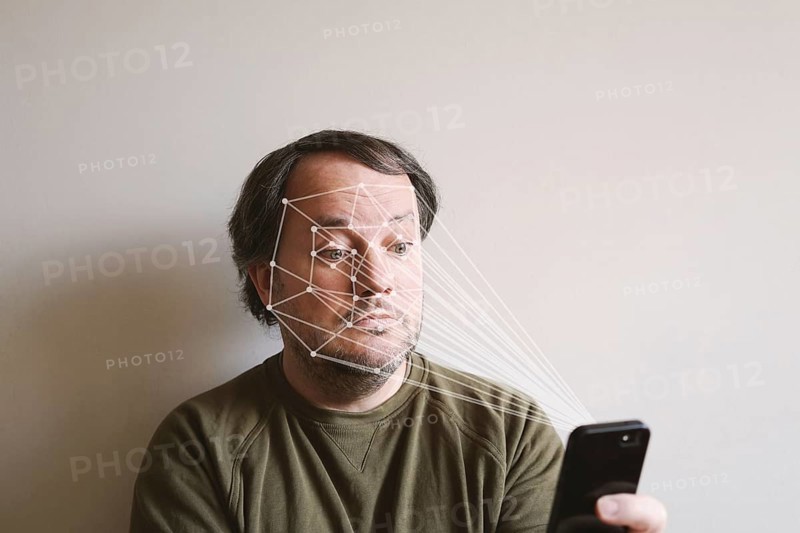 facial recognition by smartphone allows biometric authentication and face expression tracking