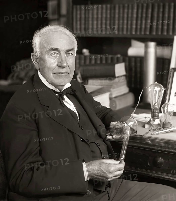 Thomas Alva Edison with his lightbulb, digitally edited